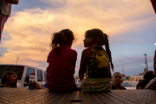 Children gathered outside representing Colorado's immigration and sanctuary cities