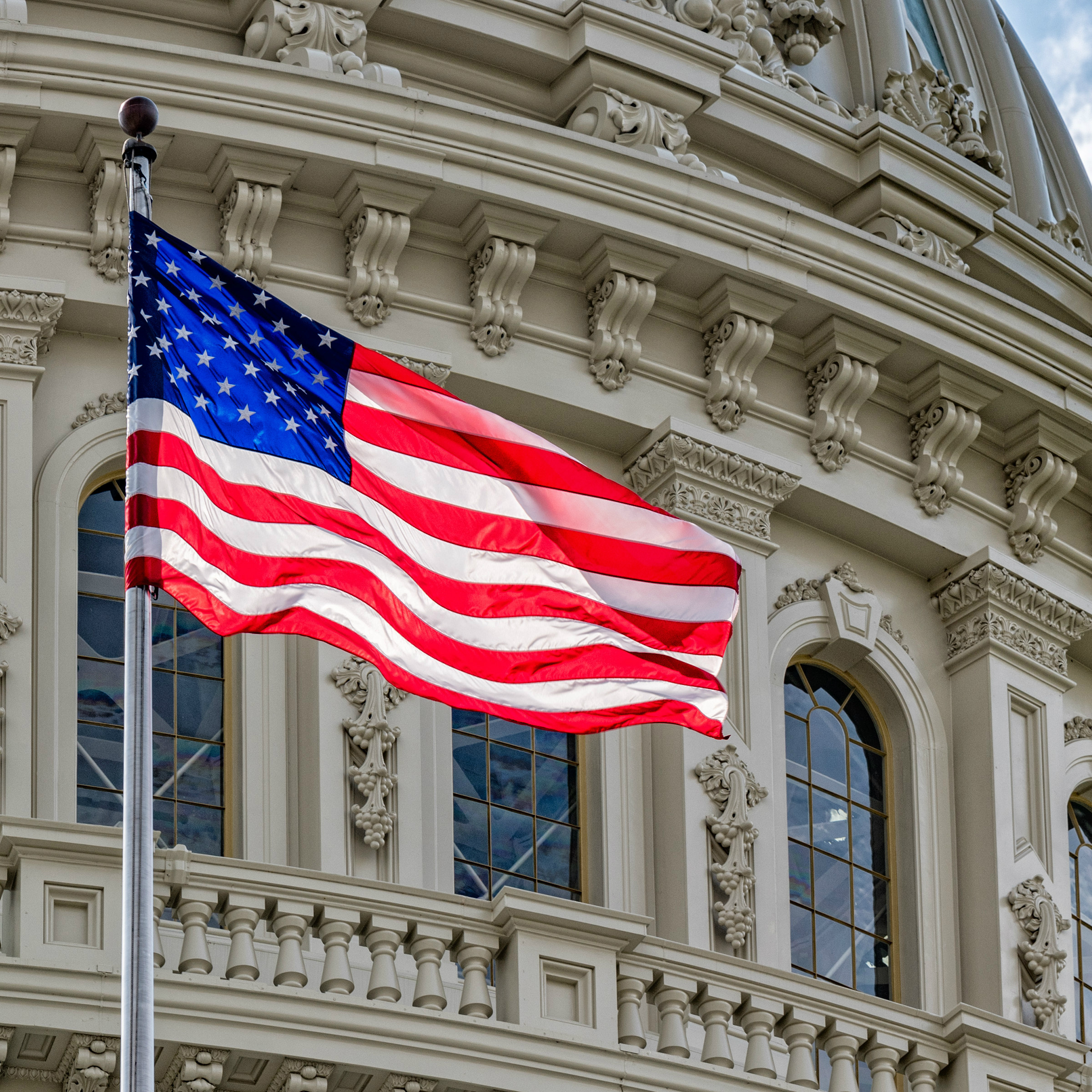 US capitol and flag representing national interest waivers (NIW) for Shaftel Law