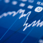 Stock market graph representing E-1 visas for treaty traders for Denver immigration firm Shaftel Law